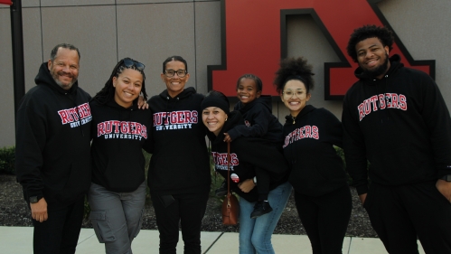 family wearing matching Rutgers sweatshirt during Parent Family Weekend