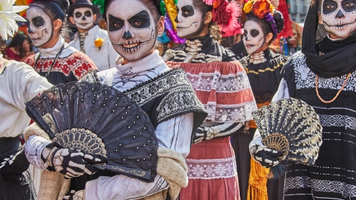 crowds dress up for Day of the Dead celebration in Mexico City
