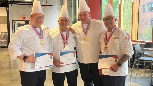 Rutgers Chefs pose for a pictures with their awards