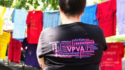 person wearing Violence Protection and Victim Assistance t-shirt