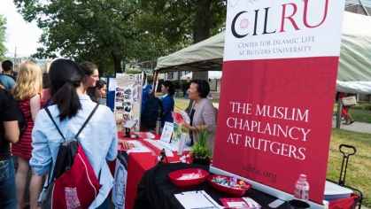 students visit the multifaith council table