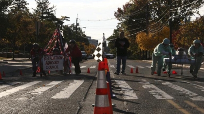 students line up for bed races at Rutgers–New Brunswick
