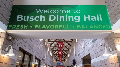 banner hanging in the hallway of Busch dining hall that says Welcome to Busch Dining Hall fresh flavorful balanced