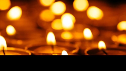 a collection of burning candles