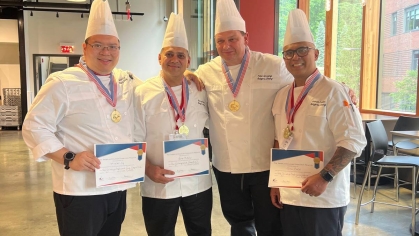 Rutgers Chefs pose for a pictures with their awards