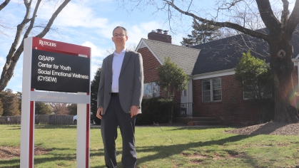 Dr. Joshua Langberg poses in front of the building housing the Center for Youth Social and Emotional Wellness (CYSEW)