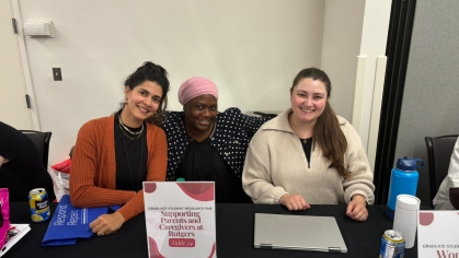 Leaders of SPCR pose for a photo at the Graduate Resource Fair