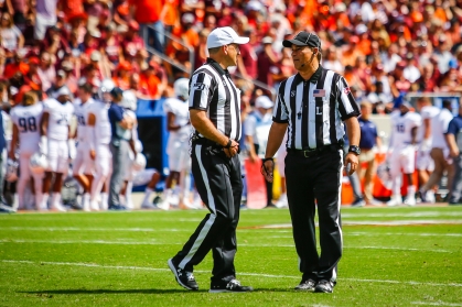 Matarante conferring with fellow official Duane Heydt
