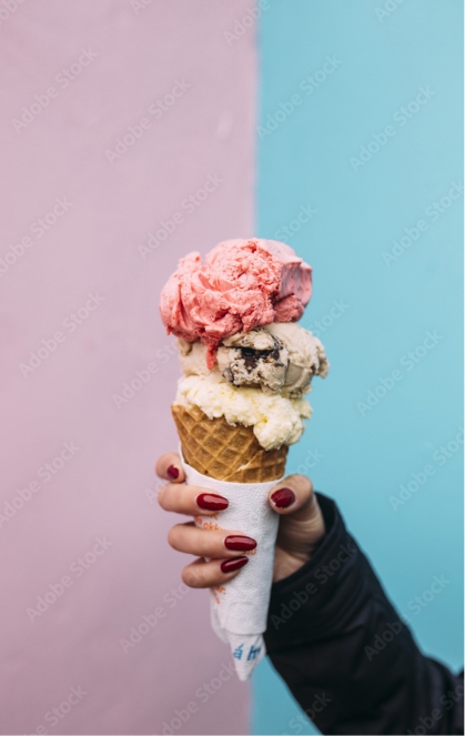 person holding ice cream cone