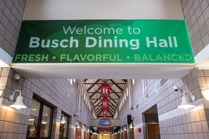 banner hanging in the hallway of Busch dining hall that says Welcome to Busch Dining Hall fresh flavorful balanced