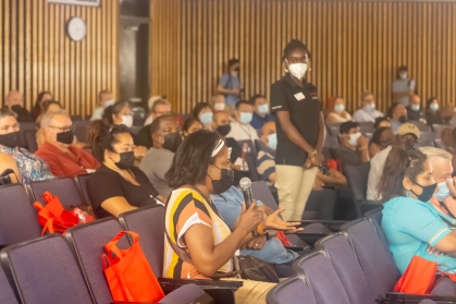 A parent asks a question at Parent and Family Orientation